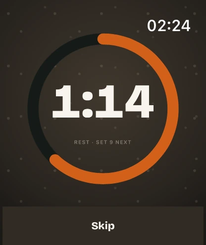 The STREEQ watch rest timer counting 1:14 down to set 9.